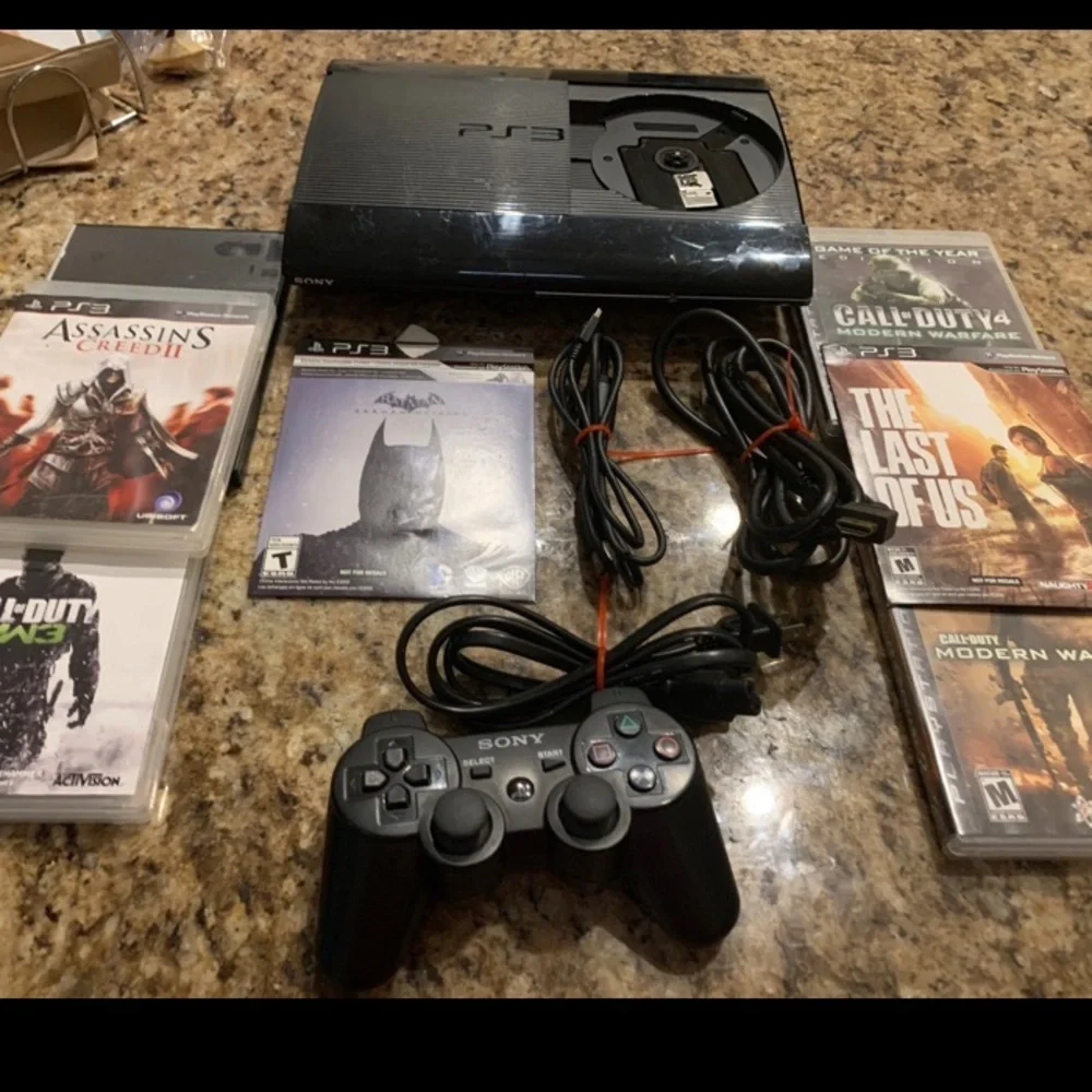 Sony PlayStation 3  Super Slim 250GB  Bundle, Model CECH 4001B + (7) Games